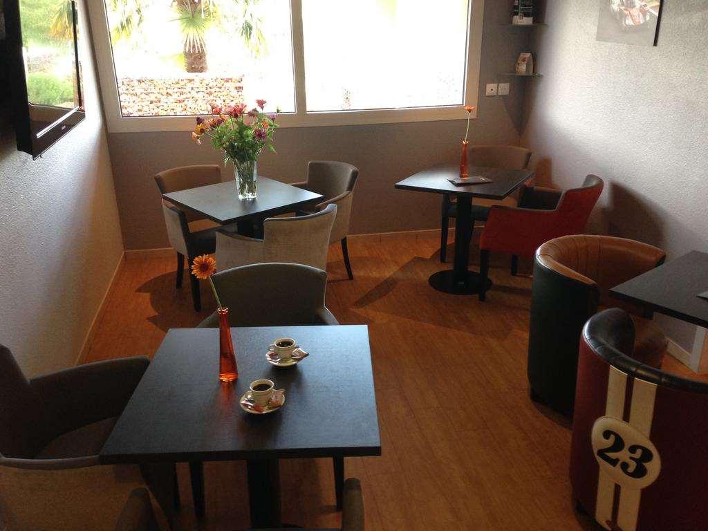 Brit Hotel Les Evens Saint-Saturnin  Restaurang bild